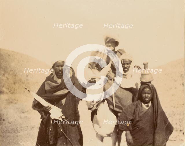 Men with woman riding mule, about 1860-1880. Creator: Unknown.