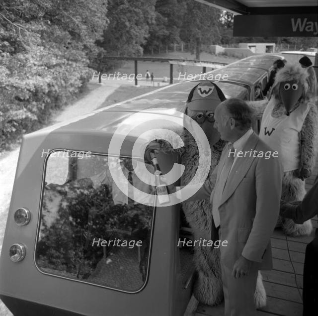 The Wombles with Lord Montagu at opening of Beaulieu Monorail 1974. Creator: Unknown.