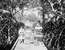 A Seminole mother and children, c.between 1910 and 1920. Creator: Unknown.