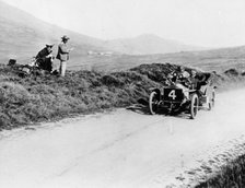 Charles Rolls on the way to winning the Isle of Man TT race in a 20 hp Rolls-Royce, 1906. Artist: Unknown