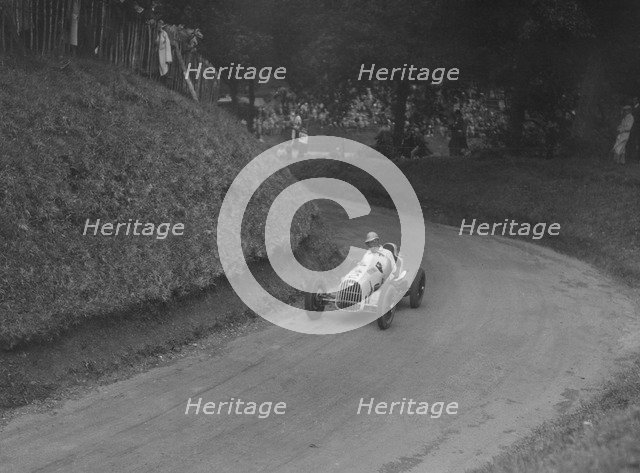 Austin 7 of LP Driscoll competing in the MAC Shelsley Walsh Speed Hill Climb, Worcestershire, 1935. Artist: Bill Brunell.