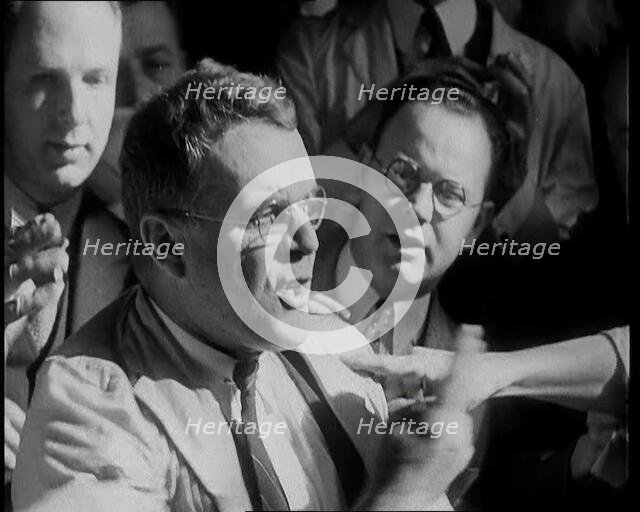 Crowd of Civilians Buying and Selling Stocks and Shares, 1932. Creator: British Pathe Ltd.