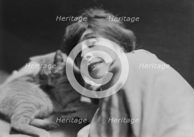 King, Daisy, Miss, with Buzzer the cat, portrait photograph, 1914 June. Creator: Arnold Genthe.