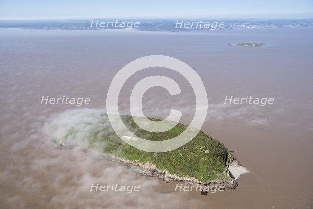 Low cloud over the island of Steep Holm, North Somerset, 2018. Creator: Historic England Staff Photographer.