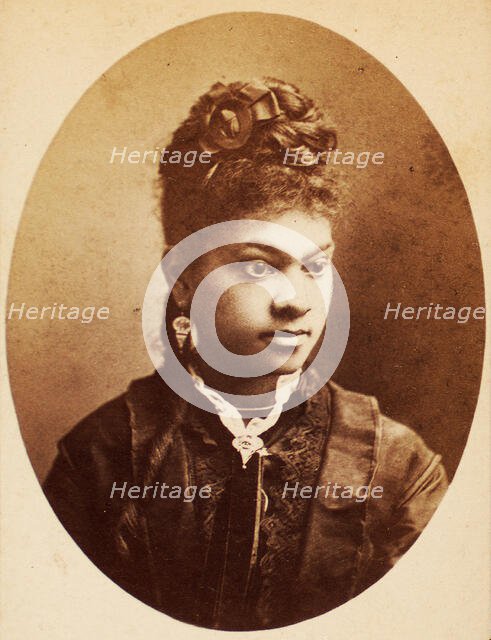 Oval quarter-length portrait of unidentified young woman, her bodice center trimmed..., c1870-c1879. Creators: Unknown, Moses Parker Rice.