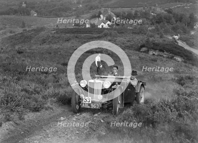1936 MG TA of the Three Musketeers team taking part in the NWLMC Lawrence Cup Trial, 1937. Artist: Bill Brunell.