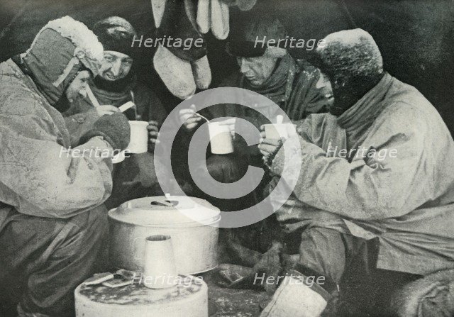 'Members of the Polar Party Having A Meal in Camp', c1911, (1913). Artist: Unknown.