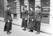Policewomen being inspected by Mary S Allen in London, May 1915. Artist: Unknown