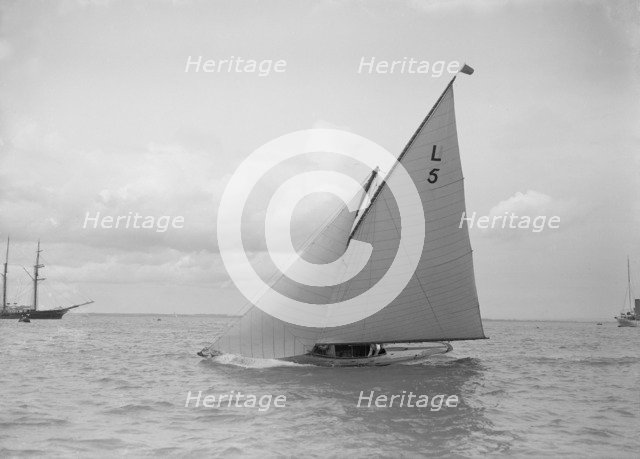 The 6 Metre 'Jonquil' sailing close-hauled, 1912. Creator: Kirk & Sons of Cowes.