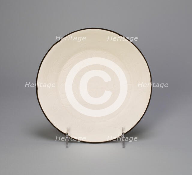 Lobed Dish with Lotus Sprays and Curled Feather-Like Leaves, Northern Song dynasty, 11th century. Creator: Unknown.