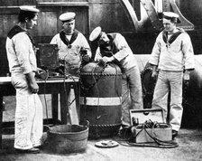 British sailors wiring a mine, First World War, 1914. Artist: Unknown