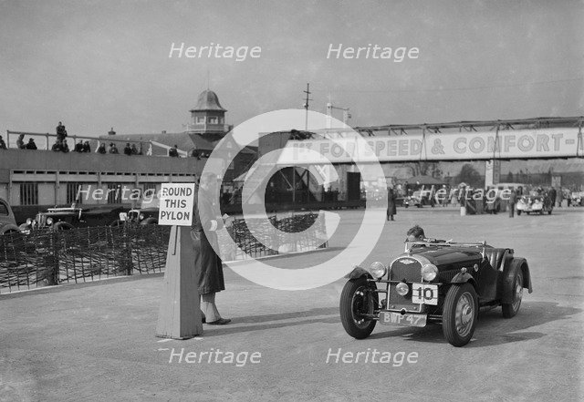 Morgan 4/4 competing in the JCC Rally, Brooklands, Surrey, 1939. Artist: Bill Brunell.