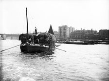 Dumpy barge on the Thames loaded with hay or esparto, London, c1905. Artist: Unknown