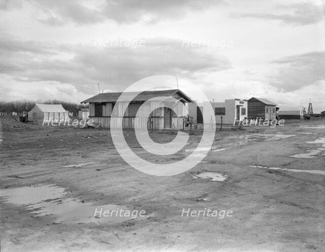 Street and homes in "Little Oklahoma", California, 1936. Creator: Dorothea Lange.