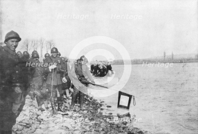 2nd Moroccan division bathes its flags in the Rhine, Huningue, Alsace, France, 21 November 1918. Artist: Unknown