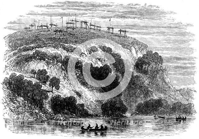 Native North American burial ground, showing the dead on raised platforms, 1876. Artist: Unknown