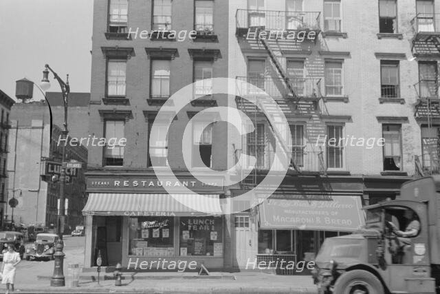 House fronts, 61st Street between 1st and 3rd Avenues, New York, 1938. Creator: Walker Evans.