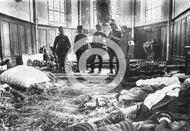 ''Scenes de Guerre; L'ennemi abandonne aussi des ambulances', 1914. Creator: Unknown.