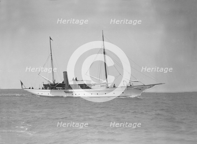 The steam yacht 'Titania' under way, 1911. Creator: Kirk & Sons of Cowes.