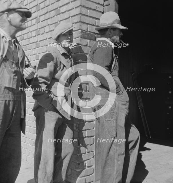 Destitute farm families, FSA distributing depot, Bakersfield, Kern County, California, 1938. Creator: Dorothea Lange.