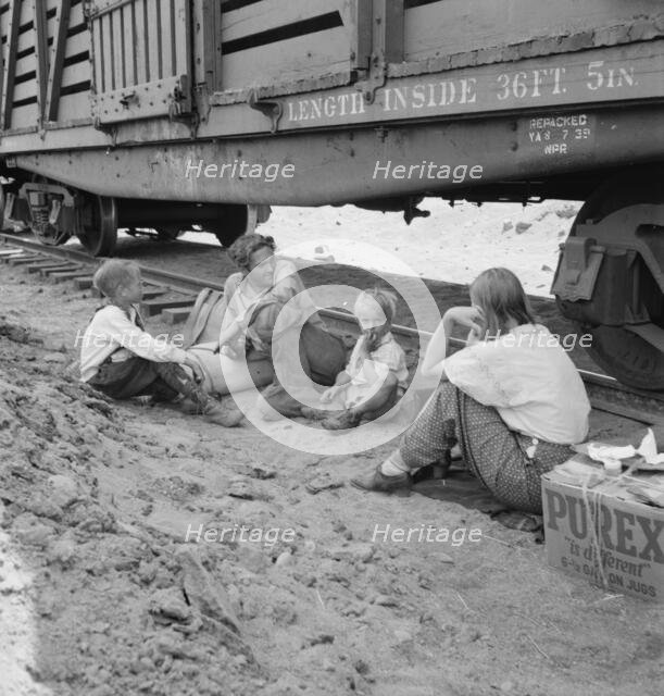 Family who traveled by freight train, Washington, Toppenish, Yakima Valley, 1939. Creator: Dorothea Lange.