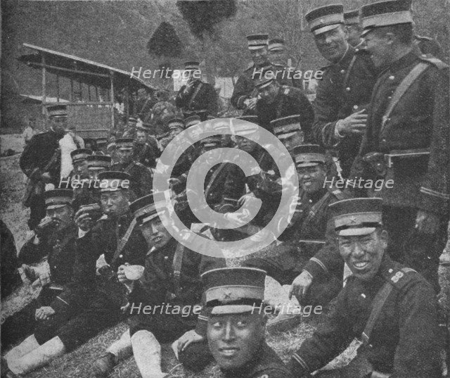 Japanese soldiers on the way to the front: the noonday meal of tea and rice, 1904-1905 (1907). Artist: Unknown.