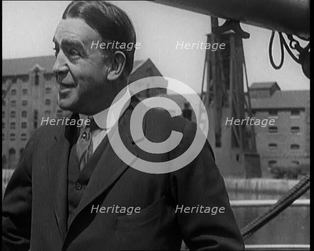 Sir Ernest Shackleton Standing on a Boat, 1921. Creator: British Pathe Ltd.