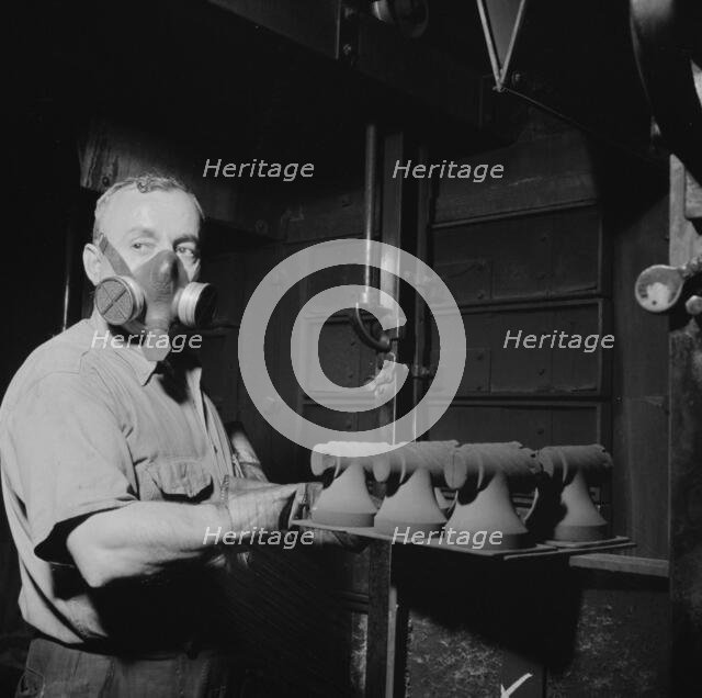 Hot cores to be used by the U.S. Army to make molds for meat..., New Britain, Connecticut, 1943. Creator: Gordon Parks.