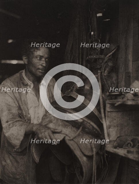 Man With A Saddle, c1920s. Creator: Doris Ulmann.