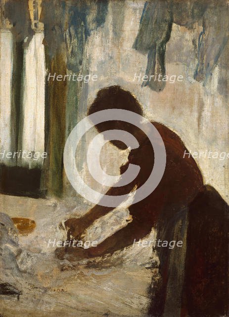 A Woman Ironing, 1873. Creator: Edgar Degas.