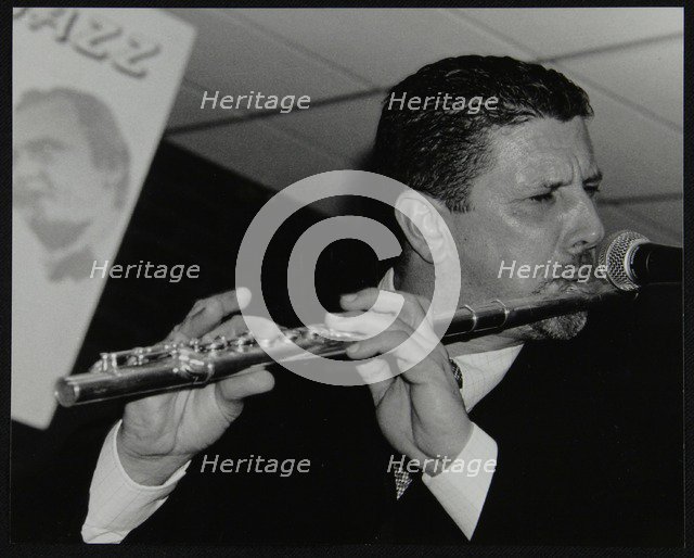 Benn Clatworthy playing the flute at The Fairway, Welwyn Garden City, Hertfordshire, 2002. Artist: Denis Williams