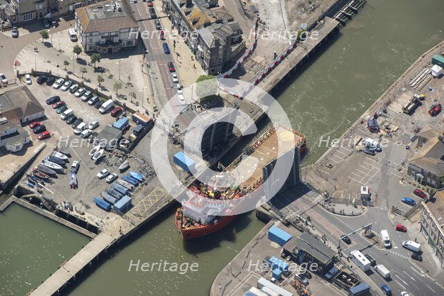 The offshore supply vessel Putford Aries passing through Lowestoft bascule bridge, Suffolk, 2021. Creator: Damian Grady.