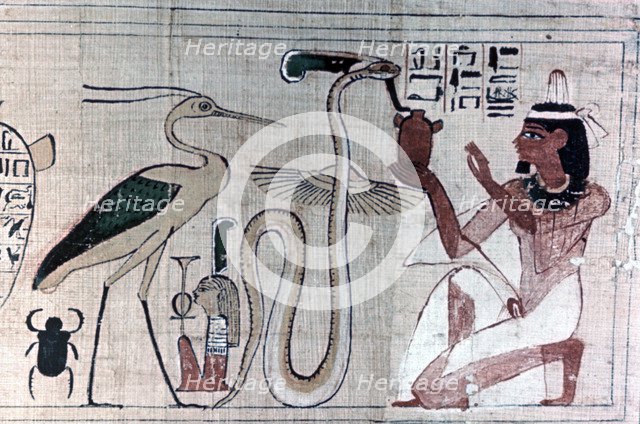 Ancient Egyptian papyrus of death kneeling before a snake. Artist: Unknown