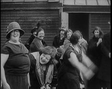 A Group of Plus Size Female Civilians Exercising on a Beach, 1920. Creator: British Pathe Ltd.