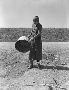 A grandmother in a migrant camp, Stanislaus County, California, 1939. Creator: Dorothea Lange.