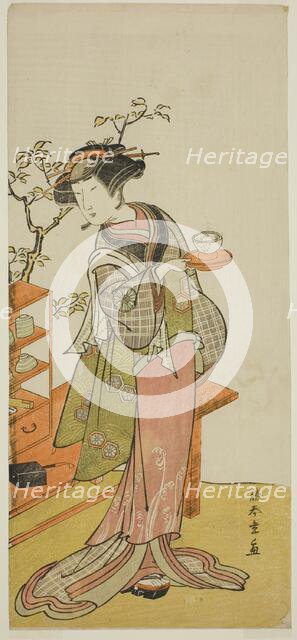 The Actor Nakamura Tomijuro I as the Waitress Otake in the Play Chigo Suzuri Aoyagi..., c. 1777. Creator: Shunsho.