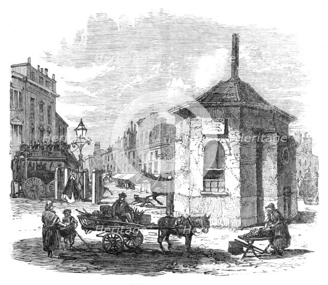 Turnpike-gates in and near London just demolished: Islington Gate, 1864.  Creator: Unknown.