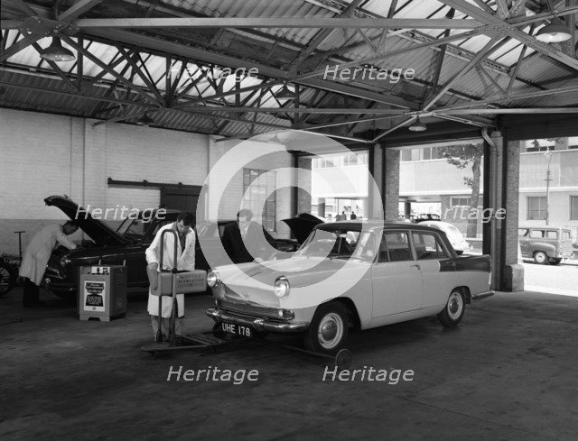 Scene in Globe & Simpson's auto electrical workshop, Nottingham, Nottinghamshire, 1961. Artist: Michael Walters
