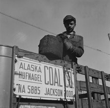 Possibly: Negro coal hauler for the Alaska Hufnagel Coal Company, Washington, D.C., 1942. Creator: Gordon Parks.