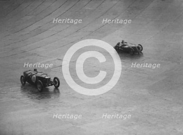 Riley 9 Brooklands and Austin 7 racing at a BARC meeting, Brooklands, Surrey, 1931 Artist: Bill Brunell.