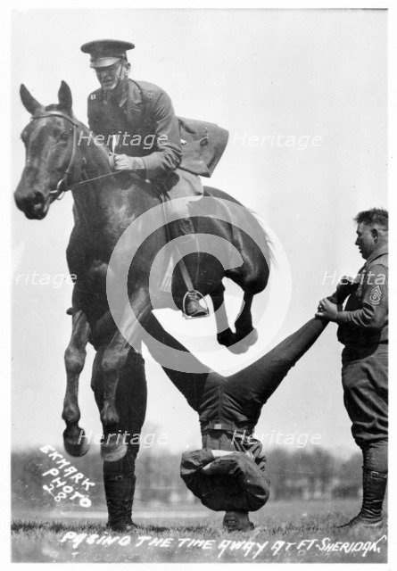 Soldiers performing equestrian stunts, Fort Sheridan, Illinois, USA, 1920. Artist: Unknown