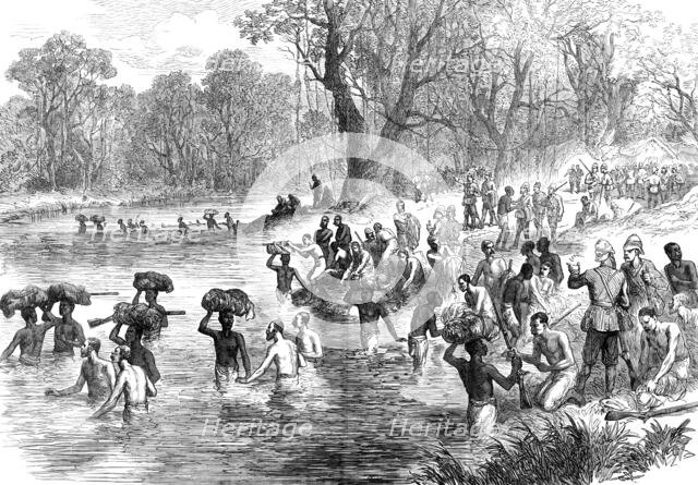 The Ashantee War - the return from Coomassie: crossing a river...sketch by our special artist, 1874. Creator: Unknown.