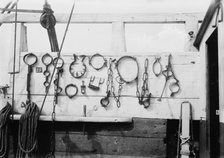 Torture irons on SUCCESS, between c1910 and c1915. Creator: Bain News Service.