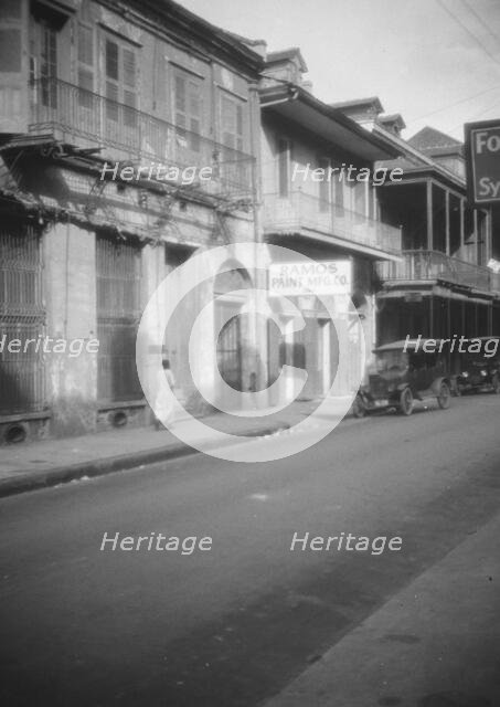View down a street, New Orleans, between 1920 and 1926. Creator: Arnold Genthe.