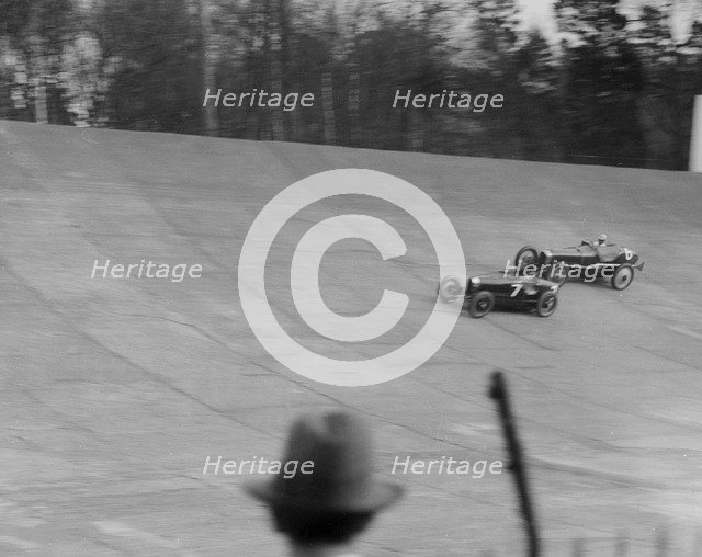 Bugatti Type 35 of EM Thomas and Ballot of Jack Dunfee racing at a BARC meeting, Brooklands, 1930. Artist: Bill Brunell.
