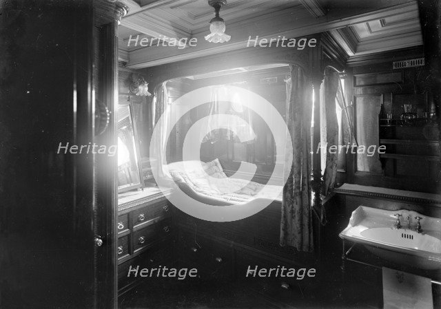 Interior of midships cabin on steam yacht 'Venetia', 1920. Creator: Kirk & Sons of Cowes.