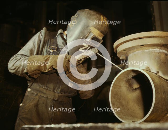 Welder making boilers for a ship, Combustion Engineering Co., Chattanooga, Tenn., 1942. Creator: Alfred T Palmer.