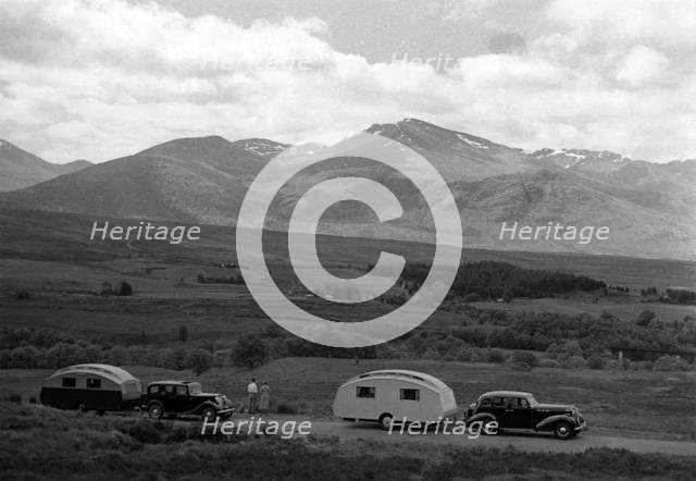 1936 Austin Twenty with caravan and 1936 Oldsmobile Eight with caravan. Creator: Unknown.