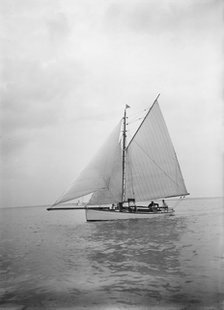 The cutter 'Blue Bird' under sail, 1934. Creator: Kirk & Sons of Cowes.