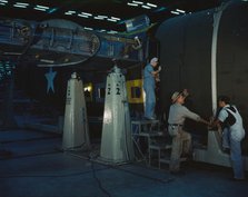 Assembling Liberator Bomber, Consolidated Aircraft Corp., Fort Worth, Texas, 1942. Creator: Howard Hollem.